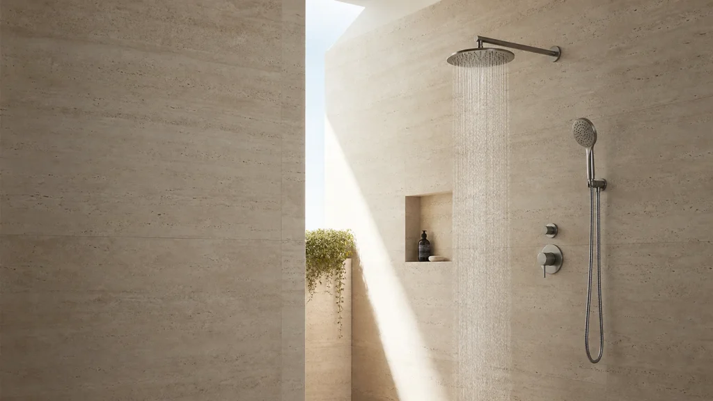 Contemporary shower space with natural stone surfaces